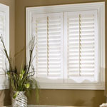 Plantation shutters in a window